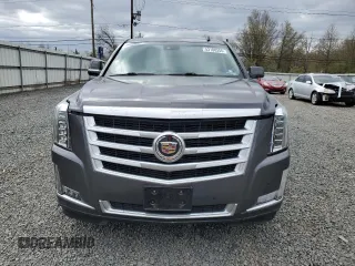 2015 Cadillac Escalade Luxury z VIN 1GYS4BKJXFR238094, wystawiony jako Copart lot #53188355 z przebiegiem Nie podano mil oraz Szkody całkowita. Historia ofert i sprzedaży dostępna na DreamBid. Obrazek 5.