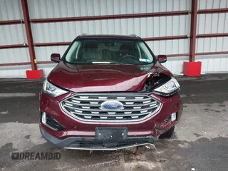 2019 Ford Edge SEL z VIN 2FMPK4J96KBB18838, wystawiony jako IAAI lot #42237001 z przebiegiem 72 875 mil mil oraz . Historia ofert i sprzedaży dostępna na DreamBid. Obrazek 12.