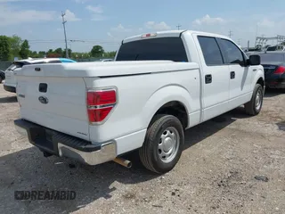 2014 Ford F-150 XL with VIN 1FTEW1CMXEKD40762, listed as a IAAI auction lot 42400704 with 75,769 mi miles and . Bid and sale history available at DreamBid. Image 4.