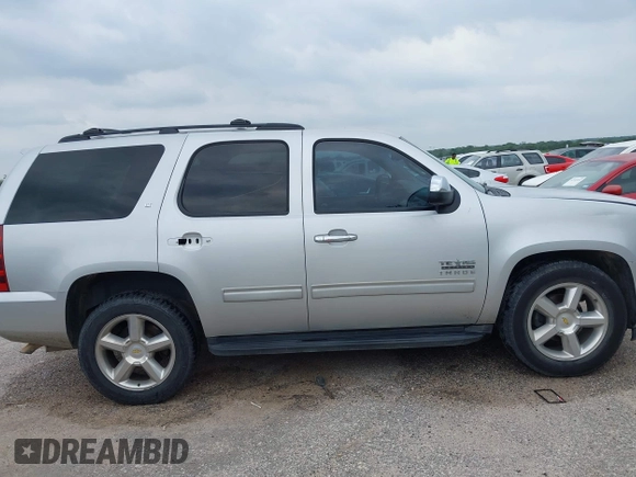 2011 Chevrolet Tahoe LT with VIN 1GNSCBE05BR190310, listed as a IAAI auction lot 42243623 with 249,453 mi miles and . Bid and sale history available at DreamBid. Image 13.