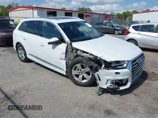 2018 Audi Q7 Premium z VIN WA1AHAF77JD045349, wystawiony jako IAAI lot #42227264 z przebiegiem 93 865 mil mil oraz . Historia ofert i sprzedaży dostępna na DreamBid. Obrazek 1.