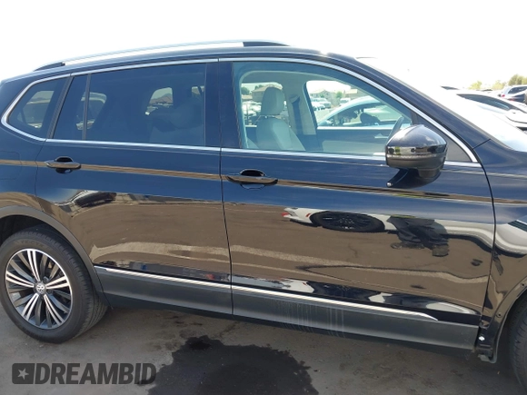 2018 Volkswagen Tiguan SEL with VIN 3VV3B7AX4JM056650, listed as a IAAI auction lot 42394948 with 35,696 mi miles and . Bid and sale history available at DreamBid. Image 14.