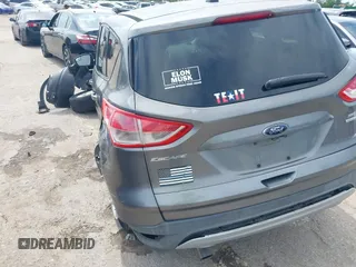 2014 Ford Escape SE z VIN 1FMCU9GX9EUC01478, wystawiony jako IAAI lot #42370409 z przebiegiem 158 154 mil mil oraz . Historia ofert i sprzedaży dostępna na DreamBid. Obrazek 3.