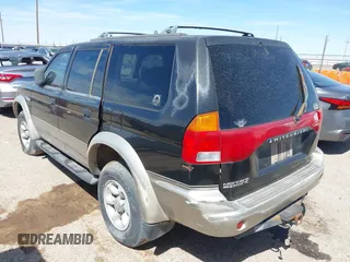 1998 Mitsubishi Montero LS z VIN JA4MT31P9WP005522, wystawiony jako IAAI lot #42047242 z przebiegiem Nie podano mil oraz . Historia ofert i sprzedaży dostępna na DreamBid. Obrazek 3.