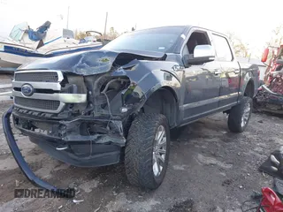 2015 Ford F-150 XLT with VIN 1FTEW1EF2FFA87607, listed as a IAAI auction lot 41336805 with 148,922 mi miles. Bid and sale history available at carsss.com. Image 2.
