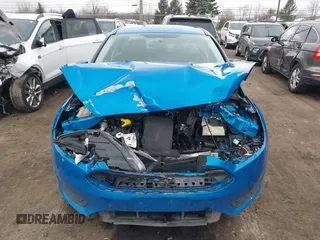2017 Ford Focus SE with VIN 1FADP3F24HL243981, listed as a IAAI auction lot 40987789 with 56,988 mi miles and . Bid and sale history available at DreamBid. Image 12.