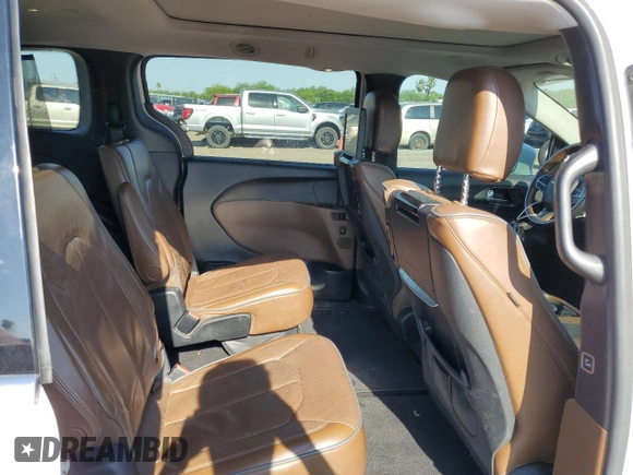 2017 Chrysler Pacifica Limited z VIN 2C4RC1GG5HR591807, wystawiony jako Copart lot #56651935 z przebiegiem 163 948 mil mil oraz Szkoda całkowita • Salvage title. Historia ofert i sprzedaży dostępna na DreamBid. Obrazek 11.