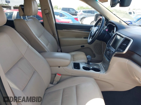 2014 Jeep Grand Cherokee Limited with VIN 1C4RJEBG9EC201512, listed as a IAAI auction lot 42091266 with 129,897 mi miles and . Bid and sale history available at DreamBid. Image 5.