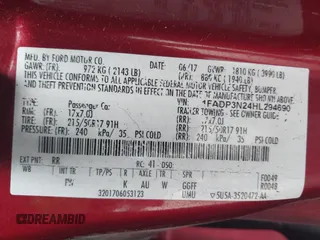 2017 Ford Focus Titanium with VIN 1FADP3N24HL294690, listed as a IAAI auction lot 39893510 with 123,089 mi miles and . Bid and sale history available at DreamBid. Image 9.