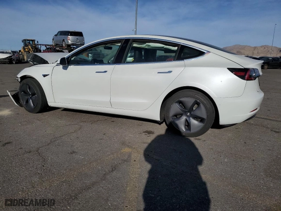 2020 Tesla Model 3 Standard Range Plus with VIN 5YJ3E1EA2LF612504, listed as a Copart auction lot 85147274 with 27,285 mi miles and Salvage Title. Bid and sale history available at carsss.com. Image 2.
