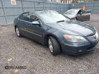 2007 Acura RL Tech Pkg with VIN JH4KB16647C000966, listed as a IAAI auction lot 41795912 with 187,237 mi miles. Bid and sale history available at carsss.com. Image 1.