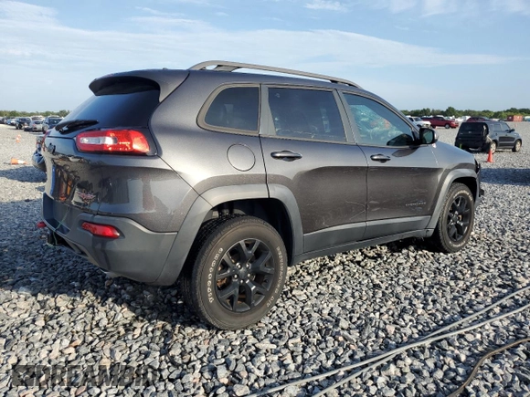 2016 Jeep Cherokee Trailhawk with VIN 1C4PJMBS4GW188840, listed as a Copart auction lot 58760605 with 117,570 mi miles and Salvage title. Bid and sale history available at DreamBid. Image 3.