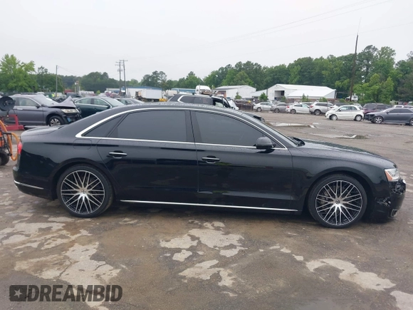 2015 Audi A8 4.0T с VIN WAU32AFD8FN019377, выставлен на аукционе IAAI как лот 42501787 с пробегом 116 355 миль миль и . История ставок и продаж доступна на DreamBid. Изображение 14.