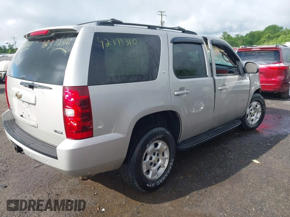 2007 Chevrolet Tahoe LTZ with VIN 1GNFK13097J406134, listed as a IAAI auction lot 42318310 with 137,106 mi miles and . Bid and sale history available at DreamBid. Image 4.