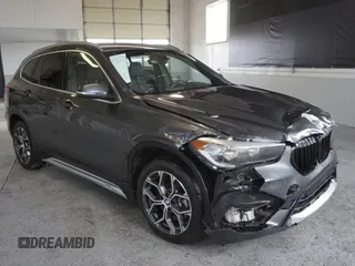 2022 BMW X1 xDrive28i with VIN WBXJG9C07N5U60771, listed as a Copart auction lot 48342085 with 12,292 mi miles and Salvage Title. Bid and sale history available at carsss.com. Image 1.