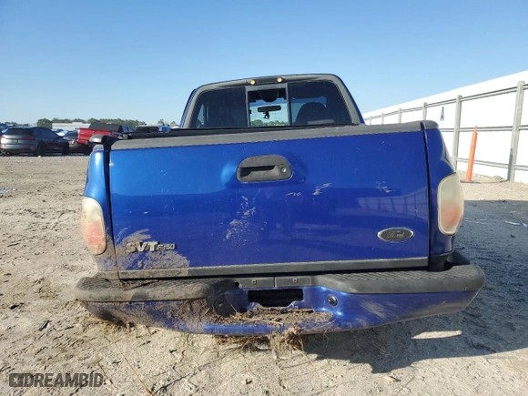 2004 Ford F-150 Heritage Lightning with VIN 2FTRF07394CA62825, listed as a Copart auction lot 45794935 with 117,044 mi miles and Salvage Title. Bid and sale history available at carsss.com. Image 6.