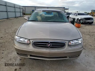 1999 Buick Regal LS with VIN 2G4WB52K4X1601132, listed as a Copart auction lot 73761404 with 92,842 mi miles and Salvage Title. Bid and sale history available at carsss.com. Image 5.