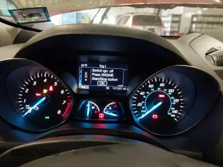 2014 Ford Escape Titanium with VIN 1FMCU9JX5EUC14849, listed as a IAAI auction lot 42037132 with 141,591 mi miles. Bid and sale history available at carsss.com. Image 7.