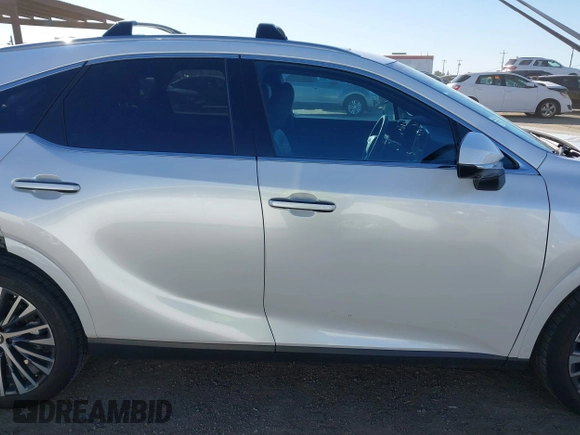 2024 Lexus RX with VIN JTJCHMAA6R2013967, listed as a IAAI auction lot 41677809 with 16,563 mi miles. Bid and sale history available at carsss.com. Image 14.
