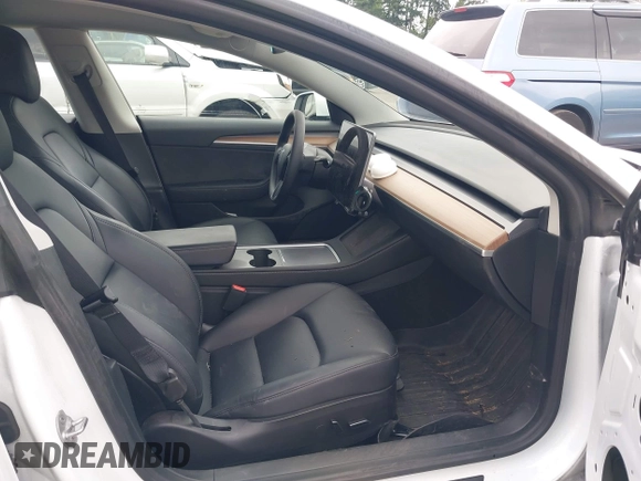 2023 Tesla Model 3 z VIN 5YJ3E1EA9PF431356, wystawiony jako IAAI lot #42620155 z przebiegiem 101 626 mil mil oraz . Historia ofert i sprzedaży dostępna na DreamBid. Obrazek 5.