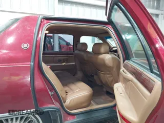 1995 Cadillac DeVille z VIN 1G6KD52B0SU247994, wystawiony jako IAAI lot #42310309 z przebiegiem 137 455 mil mil oraz . Historia ofert i sprzedaży dostępna na DreamBid. Obrazek 8.