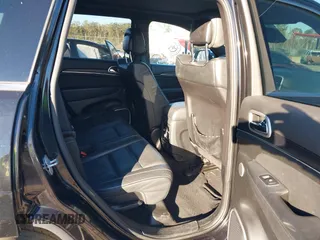 2014 Jeep Grand Cherokee Summit with VIN 1C4RJEJG1EC130727, listed as a IAAI auction lot 41269066 with 205,914 mi miles and . Bid and sale history available at DreamBid. Image 8.