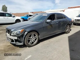 2015 Mercedes-Benz E 350 Sport with VIN WDDHF5KB5FB085434, listed as a Copart auction lot 50929595 with 101,995 mi miles and Salvage title. Bid and sale history available at DreamBid. Image 1.