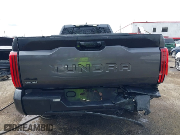 2023 Toyota Tundra with VIN 5TFKB5GDXPX002218, listed as a IAAI auction lot 41932719 with 71,335 mi miles and . Bid and sale history available at DreamBid. Image 16.