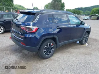 2021 Jeep Compass Trailhawk with VIN 3C4NJDDB0MT590442, listed as a IAAI auction lot 42543530 with 66,669 mi miles and . Bid and sale history available at DreamBid. Image 4.