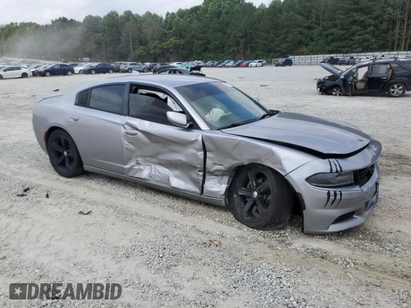 2016 Dodge Charger R/T with VIN 2C3CDXCTXGH222331, listed as a Copart auction lot 59428915 with 120,691 mi miles and Salvage title. Bid and sale history available at DreamBid. Image 4.