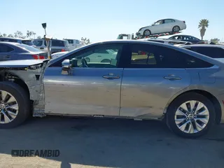 2021 Toyota Mirai XLE with VIN JTDAAAAAXMA002000, listed as a IAAI auction lot 42207752 with 33,017 mi miles and . Bid and sale history available at DreamBid. Image 15.