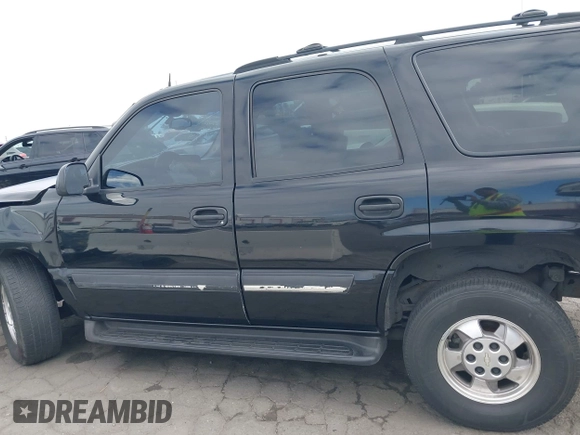2005 Chevrolet Tahoe Z71 with VIN 1GNEC13TX5R145310, listed as a IAAI auction lot 42056793 with 159,002 mi miles and . Bid and sale history available at DreamBid. Image 13.