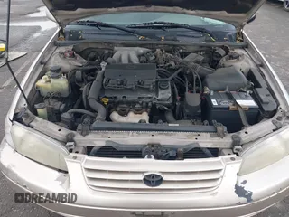 1997 Toyota Camry LE z VIN 4T1BF22K8VU916373, wystawiony jako IAAI lot #41915751 z przebiegiem 259 818 mil mil oraz . Historia ofert i sprzedaży dostępna na DreamBid. Obrazek 10.