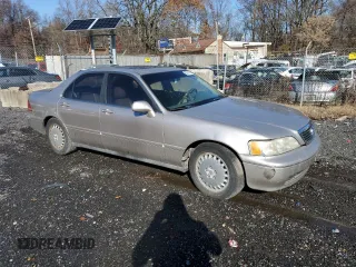 1996 Acura RL with VIN JH4KA9655TC012935, listed as a Copart auction lot 80861334 with 0 mi miles and Salvage Title. Bid and sale history available at carsss.com. Image 4.