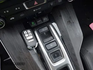 2018 Honda Clarity Touring with VIN JHMZC5F32JC014588, listed as a IAAI auction lot 42066633 with 89,316 mi miles. Bid and sale history available at carsss.com. Image 11.