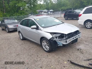 2017 Ford Focus SE z VIN 1FADP3F2XHL320241, wystawiony jako IAAI lot #42364959 z przebiegiem 67 394 mil mil oraz . Historia ofert i sprzedaży dostępna na DreamBid. Obrazek 1.