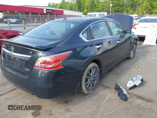 2015 Nissan Altima S with VIN 1N4AL3AP0FC581215, listed as a IAAI auction lot 42157703 with Not Provided miles and . Bid and sale history available at DreamBid. Image 4.