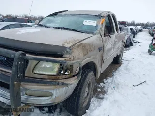 1998 Ford F-150 Standard with VIN 1FTZX18W4WNB04665, listed as a IAAI auction lot 41255136 with 182,272 mi miles. Bid and sale history available at carsss.com. Image 2.