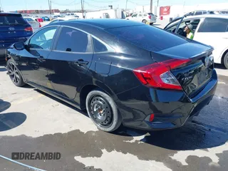 2021 Honda Civic Sport with VIN 2HGFC2F81MH529499, listed as a IAAI auction lot 41836215 with 55,833 mi miles and . Bid and sale history available at DreamBid. Image 3.