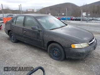 1999 Nissan Altima XE with VIN 1N4DL01DXXC148729, listed as a IAAI auction lot 41697641 with 187,596 mi miles. Bid and sale history available at carsss.com. Image 1.