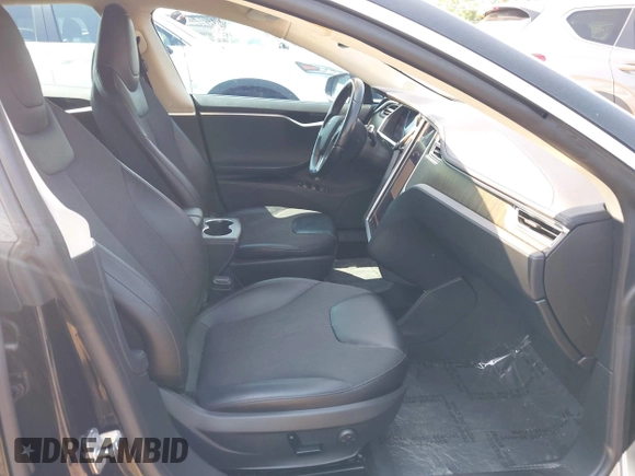 2013 Tesla Model S Performance with VIN 5YJSA1CP5DFP25346, listed as a IAAI auction lot 42463047 with 112,909 mi miles and . Bid and sale history available at DreamBid. Image 5.