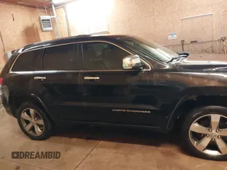 2015 Jeep Grand Cherokee Limited with VIN 1C4RJFBG8FC910133, listed as a IAAI auction lot 41289929 with 141,226 mi miles. Bid and sale history available at carsss.com. Image 13.