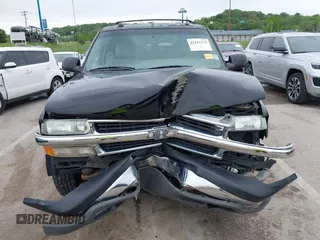 2004 Chevrolet Suburban LT z VIN 1GNFK16ZX4J291419, wystawiony jako IAAI lot #42163331 z przebiegiem 235 054 mil mil oraz . Historia ofert i sprzedaży dostępna na DreamBid. Obrazek 12.