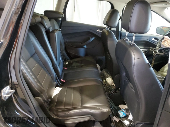 2016 Ford Escape Titanium with VIN 1FMCU0J91GUB09161, listed as a Copart auction lot 50027315 with 106,784 mi miles and Salvage Title. Bid and sale history available at carsss.com. Image 12.