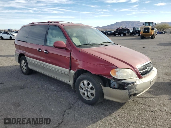 2004 Kia Sedona LX with VIN KNDUP131546612432, listed as a Copart auction lot 87326764 with 156,259 mi miles and Salvage Title. Bid and sale history available at carsss.com. Image 4.