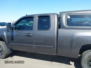 2010 Chevrolet Silverado 1500 LS with VIN 1GCSKREAXAZ137064, listed as a IAAI auction lot 42024758 with 125,401 mi miles and . Bid and sale history available at DreamBid. Image 14.