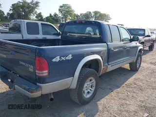 2004 Dodge Dakota SLT with VIN 1D7HG48N14S610012, listed as a IAAI auction lot 39853794 with 158,998 mi miles and . Bid and sale history available at carsss.com. Image 4.
