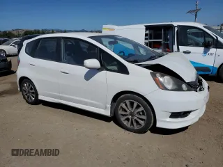2012 Honda Fit Sport with VIN JHMGE8H50CC009958, listed as a Copart auction lot 55423075 with 117,618 mi miles and Salvage Title. Bid and sale history available at DreamBid. Image 4.