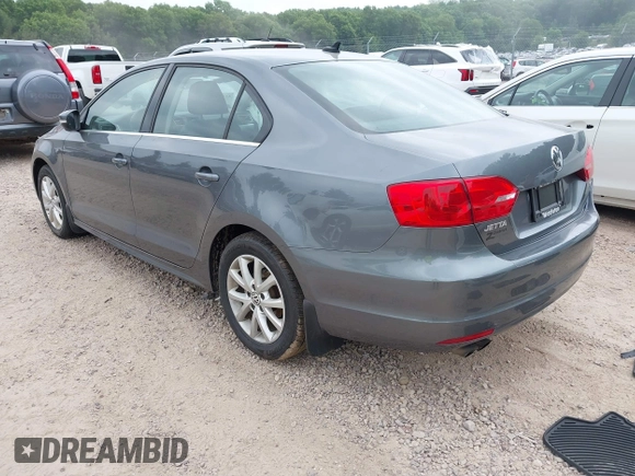 2014 Volkswagen Jetta SE with VIN 3VWD07AJ2EM209176, listed as a IAAI auction lot 42460383 with 172,550 mi miles and . Bid and sale history available at DreamBid. Image 3.