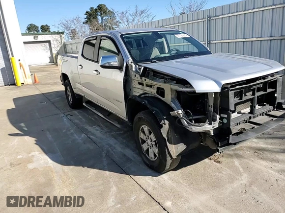 2015 GMC Canyon 2WD with VIN 1GTG5AE38F1156671, listed as a Copart auction lot 85194924 with 123,597 mi miles and Salvage Title. Bid and sale history available at DreamBid. Image 11.